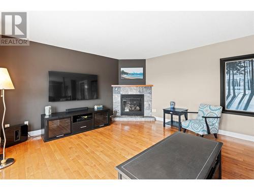 8000 Kalview Drive, Coldstream, BC - Indoor Photo Showing Living Room With Fireplace