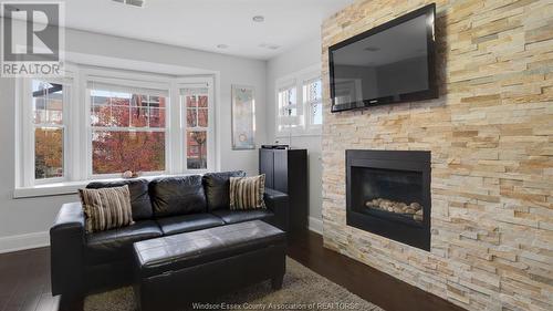 1165 Ouellette Avenue, Windsor, ON - Indoor Photo Showing Living Room With Fireplace