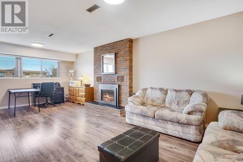 2460 Collingwood Road, West Kelowna, BC - Indoor Photo Showing Living Room With Fireplace