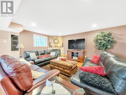 1840 St. Christopher Court, Windsor, ON - Indoor Photo Showing Living Room With Fireplace