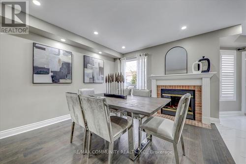 27 Merchant Avenue, Whitby, ON - Indoor Photo Showing Dining Room With Fireplace