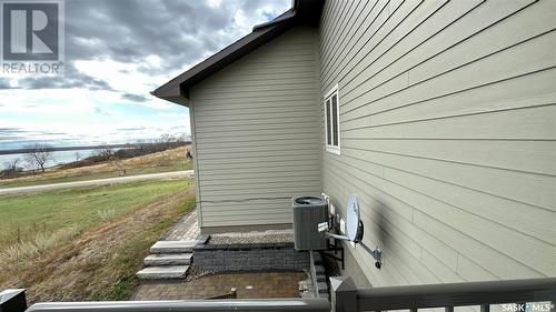 28 Kiiswa Ridge, Sun Dale, SK - Outdoor With Body Of Water With Exterior