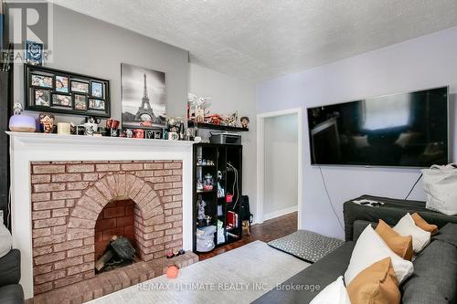 176 Rosemount Avenue, Toronto, ON - Indoor Photo Showing Living Room With Fireplace