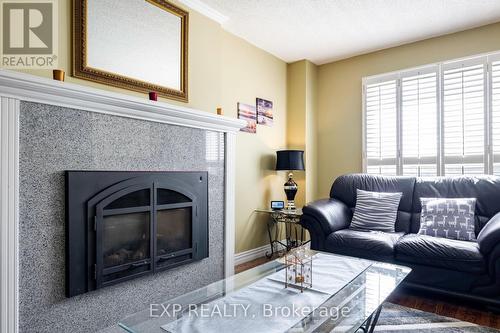 10 Ruth Avenue, Brampton, ON - Indoor Photo Showing Living Room With Fireplace