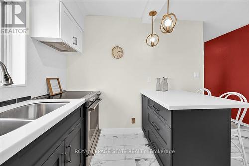 601 - 17 King Street E, Hamilton, ON - Indoor Photo Showing Kitchen With Double Sink