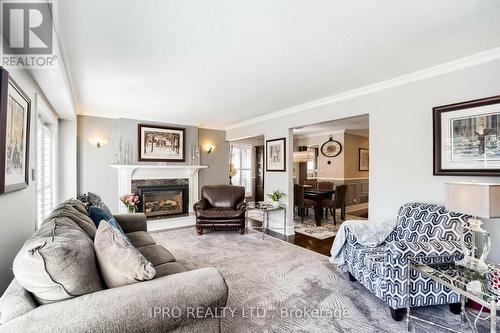 154 Harvest Drive, Milton, ON - Indoor Photo Showing Living Room With Fireplace