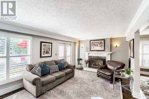 154 Harvest Drive, Milton, ON - Indoor Photo Showing Living Room With Fireplace