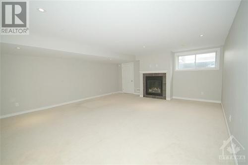 136 Mattingly Way, Ottawa, ON - Indoor With Fireplace