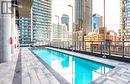 3912 - 290 Adelaide Street W, Toronto, ON  - Outdoor With In Ground Pool With Facade 
