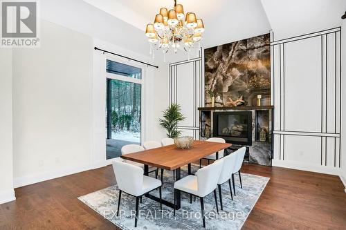 15 Glenview Heights Lane, King, ON - Indoor Photo Showing Dining Room With Fireplace