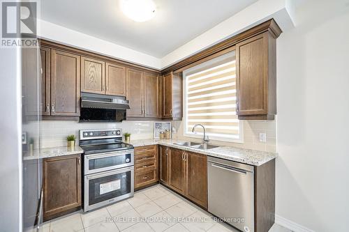 113 Grand Trunk Avenue, Vaughan, ON - Indoor Photo Showing Kitchen With Double Sink
