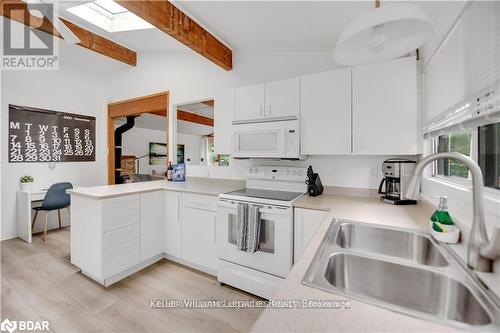 150 Moreau Parkway, Tiny, ON - Indoor Photo Showing Kitchen With Double Sink