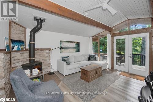 150 Moreau Parkway, Tiny, ON - Indoor Photo Showing Living Room With Fireplace