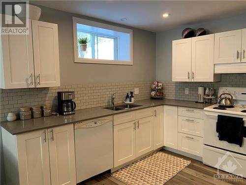 30 Fringewood Drive, Stittsville, ON - Indoor Photo Showing Kitchen With Double Sink