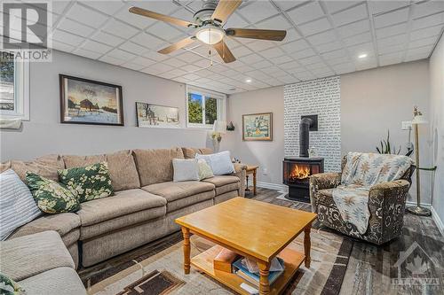 20 Salmon Side Road, Smiths Falls, ON - Indoor Photo Showing Living Room With Fireplace