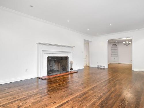 Family room - 27 Cours Laurier, Beaconsfield, QC - Indoor Photo Showing Living Room With Fireplace