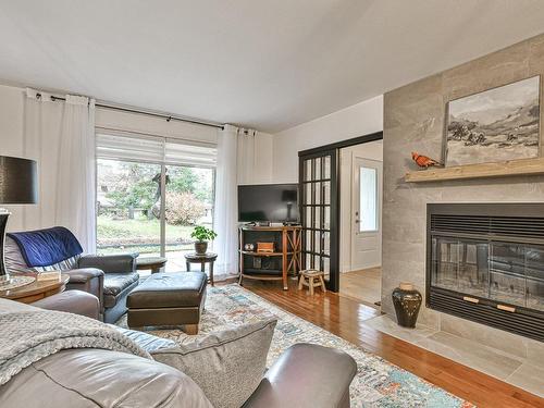 Salon - 214 Rue Desjardins, Sainte-Agathe-Des-Monts, QC - Indoor Photo Showing Living Room With Fireplace