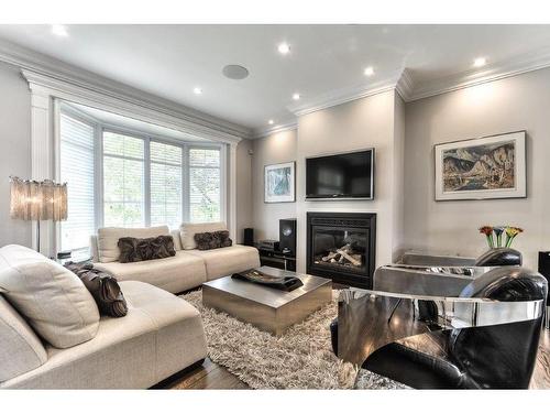 Salon - 2860 Rue Du Pic, Laval (Duvernay), QC - Indoor Photo Showing Living Room With Fireplace