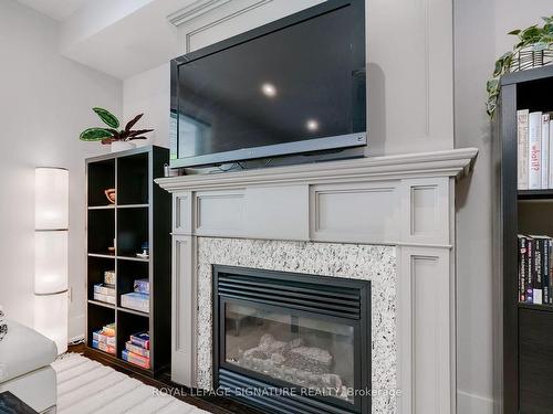 81 1/2 Boultbee Ave, Toronto, ON - Indoor Photo Showing Living Room With Fireplace
