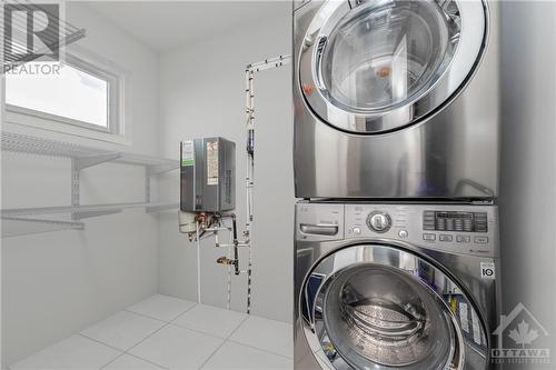 Photo Virtually Staged - 204 Mullin Private Unit#2, Ottawa, ON - Indoor Photo Showing Laundry Room