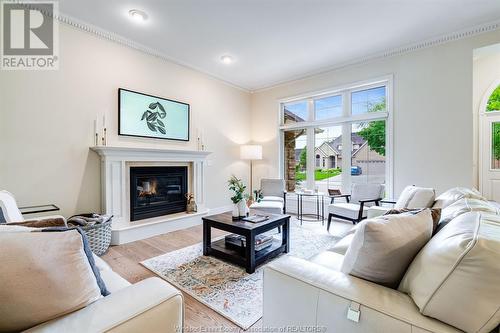472 Chambers Drive, Lakeshore, ON - Indoor Photo Showing Living Room With Fireplace