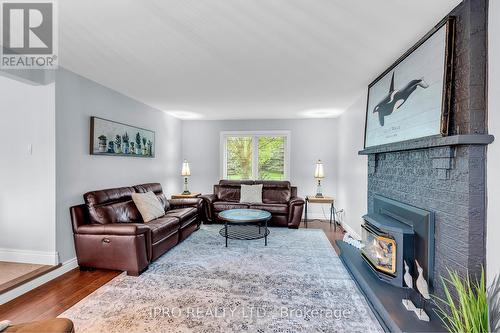 38 Riverside Drive, Mono, ON - Indoor Photo Showing Living Room With Fireplace