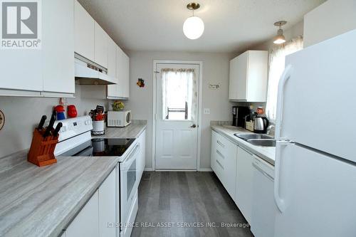 148 Wilmot Trail, Clarington, ON - Indoor Photo Showing Kitchen With Double Sink