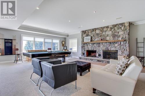 777 Lakelands Avenue, Innisfil, ON - Indoor Photo Showing Living Room With Fireplace