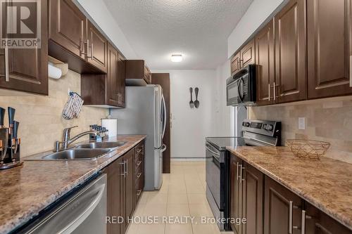 702 - 1210 Radom Street, Pickering, ON - Indoor Photo Showing Kitchen With Stainless Steel Kitchen With Double Sink