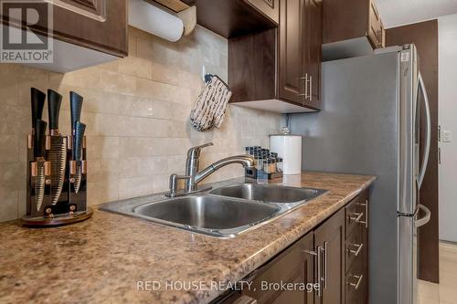 702 - 1210 Radom Street, Pickering, ON - Indoor Photo Showing Kitchen With Double Sink