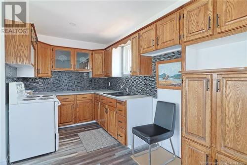 203 Main Street, Minto, NB - Indoor Photo Showing Kitchen With Double Sink