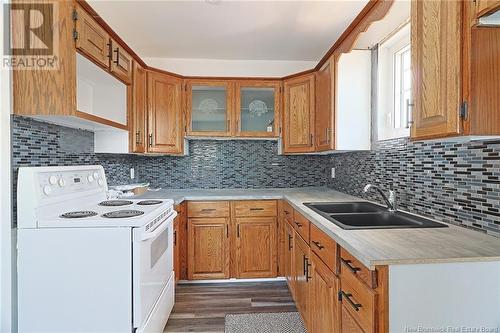 203 Main Street, Minto, NB - Indoor Photo Showing Kitchen With Double Sink