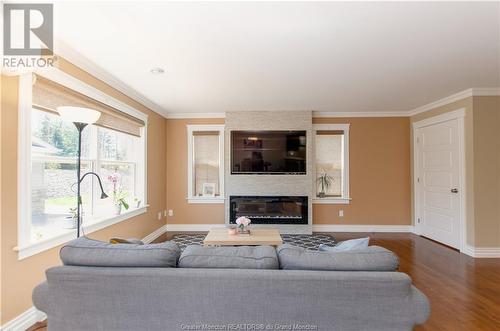 28 Poitou Crt, Dieppe, NB - Indoor Photo Showing Living Room With Fireplace