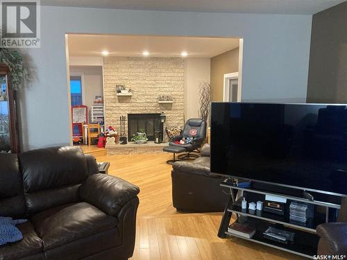 39 Bain Crescent, Saskatoon, SK - Indoor Photo Showing Living Room With Fireplace