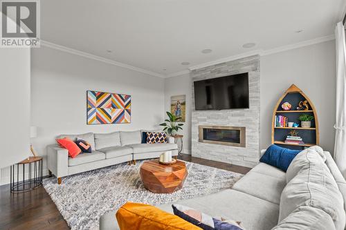 16 Bournes Close, Torbay, NL - Indoor Photo Showing Living Room With Fireplace