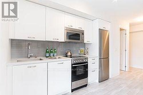 206 - 1630 Queen Street E, Toronto, ON - Indoor Photo Showing Kitchen With Upgraded Kitchen