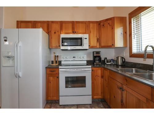 301 - 890 Dogwood Drive, Kimberley, BC - Indoor Photo Showing Kitchen With Double Sink