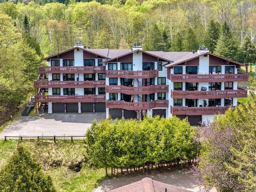 Photo aÃ©rienne - 484-211 Ch. De Lac-Tremblant-Nord, Mont-Tremblant, QC - Outdoor With Balcony With Facade