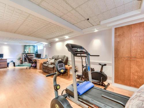 Family room - 284 Rue Janvier, Laval (Fabreville), QC - Indoor Photo Showing Gym Room