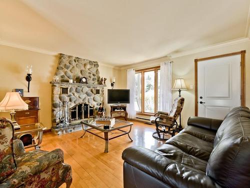 Living room - 165 Rue Bellevue, Coaticook, QC - Indoor Photo Showing Living Room With Fireplace