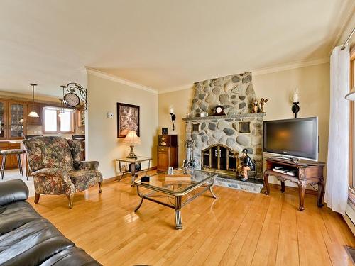 Living room - 165 Rue Bellevue, Coaticook, QC - Indoor Photo Showing Living Room With Fireplace