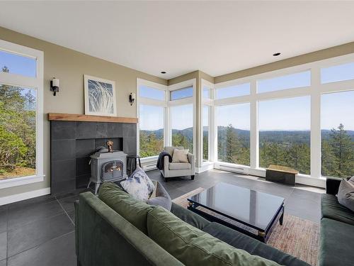 4699 Kerryview Dr, Saanich, BC - Indoor Photo Showing Living Room With Fireplace