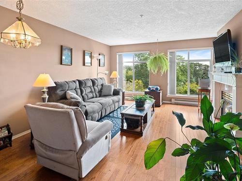 406-2511 Quadra St, Victoria, BC - Indoor Photo Showing Living Room With Fireplace