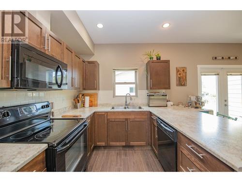 1703 43 Avenue Unit# 2, Vernon, BC - Indoor Photo Showing Kitchen With Double Sink