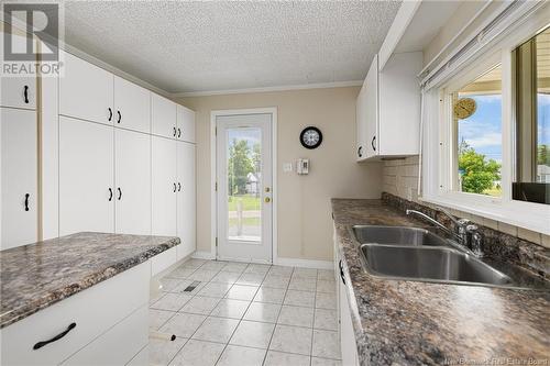 10 Pelican Avenue, Grand-Barachois, NB - Indoor Photo Showing Kitchen With Double Sink