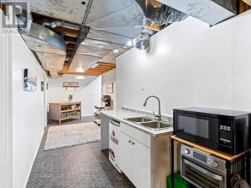 6 Yew Place, Whitehorse, YT - Indoor Photo Showing Kitchen With Double Sink