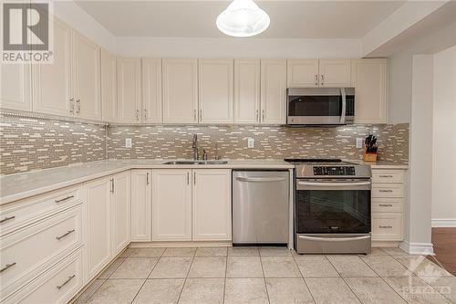 542 Langelier Avenue, Ottawa, ON - Indoor Photo Showing Kitchen With Stainless Steel Kitchen With Double Sink With Upgraded Kitchen