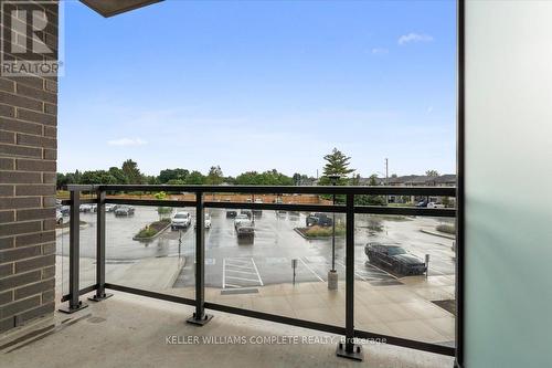 211 - 26 Lowes Road W, Guelph (Clairfields), ON - Outdoor With Balcony