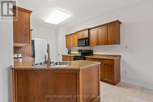 261 Meadowsweet Trail, London, ON - Indoor Photo Showing Kitchen With Double Sink