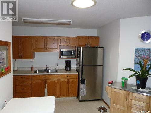 B 1307 98Th Street, Tisdale, SK - Indoor Photo Showing Kitchen With Double Sink